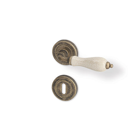 Antik R - Bronze matt patina/ Porzellan - Türgriff auf runder Rosette